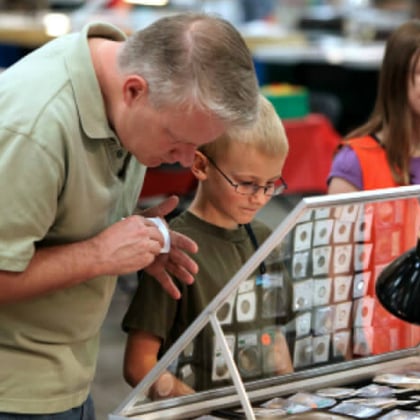 father son coin show young numismatist kid